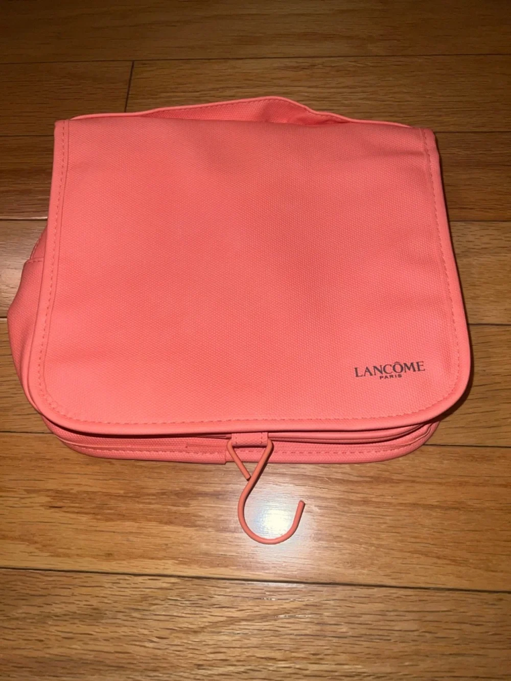 Lancôme Hanging makeup or toiletry bag in coral. New, never used.